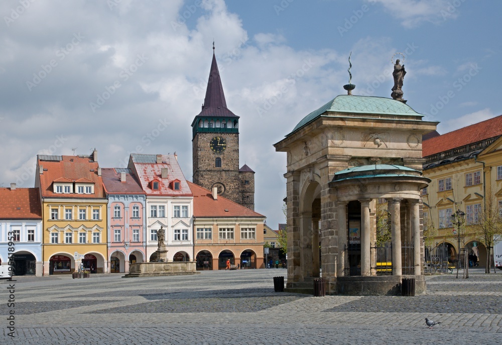 Square with historic houses and Valdicka gate in Jicin, Cesky Raj, Czech republic