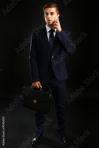 Elegant man in suit with br...