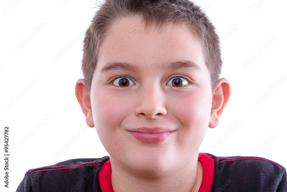 Young Wide Eyed Boy in Studio Smiling at Camera Young Wide Eyed Boy in Studio Smiling at Camera