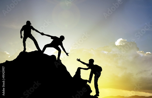 climbing helping  team work , success concept photo