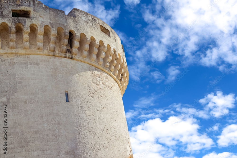 old tower of castle under blue sky with cloud