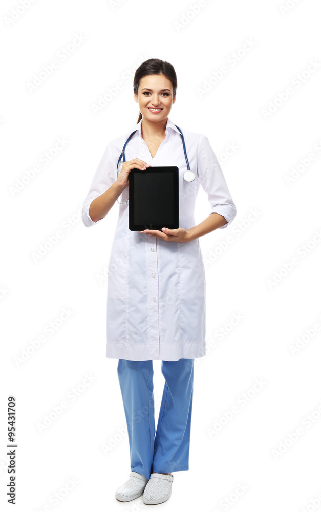 Smiling medical doctor holding a tablet isolated on white Smiling medical doctor holding a tablet isolated on white