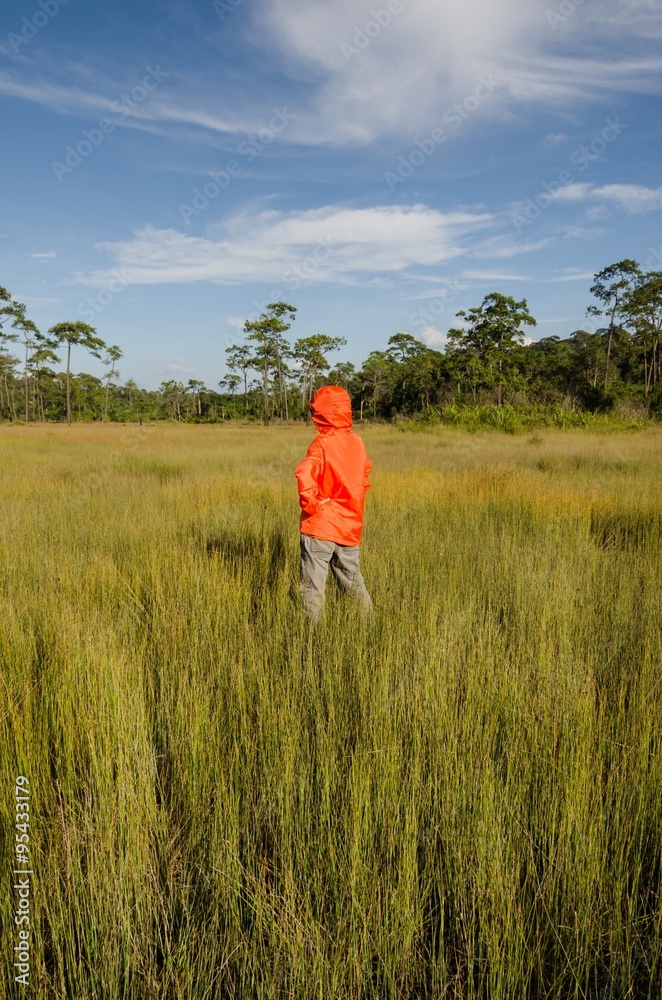 woman standing in field woman standing in field