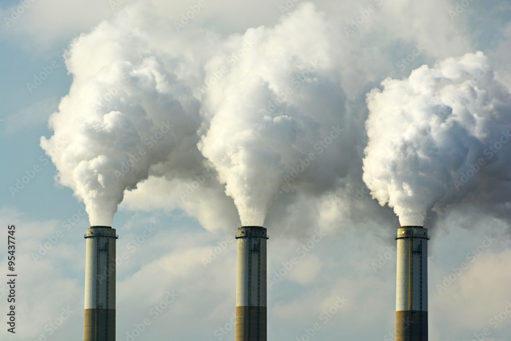 Multiple Coal Fossil Fuel Power Plant Smokestacks Emit Carbon Dioxide Pollution - obrazy, fototapety, plakaty 