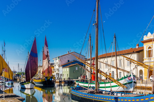 ancient sailboats on Italian Canal Port