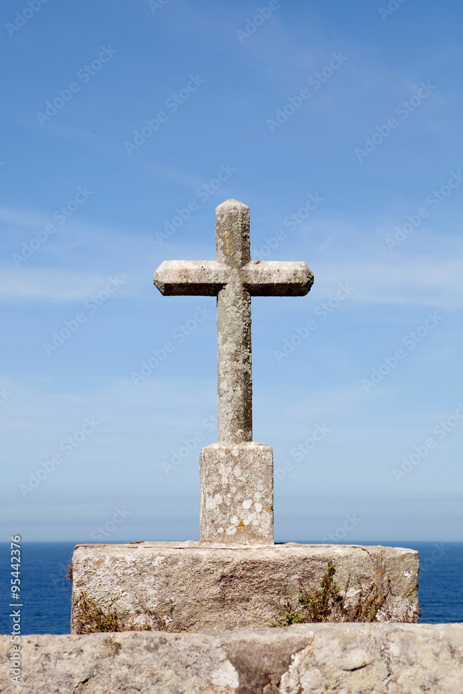 Stone cross on the Spanish coast