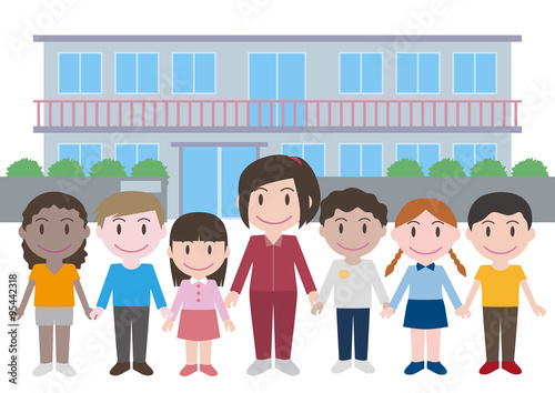 teacher and children lined up in front of the school building
