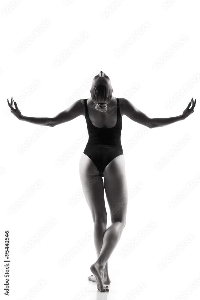 Naklejka premium Modern ballet dancer posing on white background