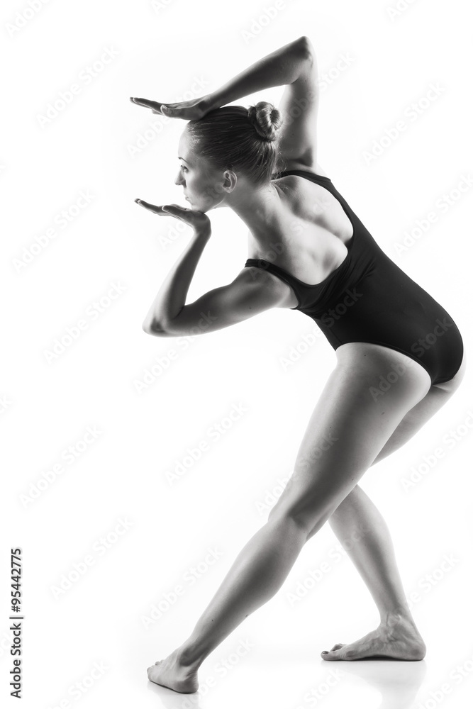 Naklejka premium Modern ballet dancer posing on white background