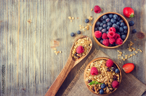 Fresh healthy breakfast with granola and berries, copy space rus