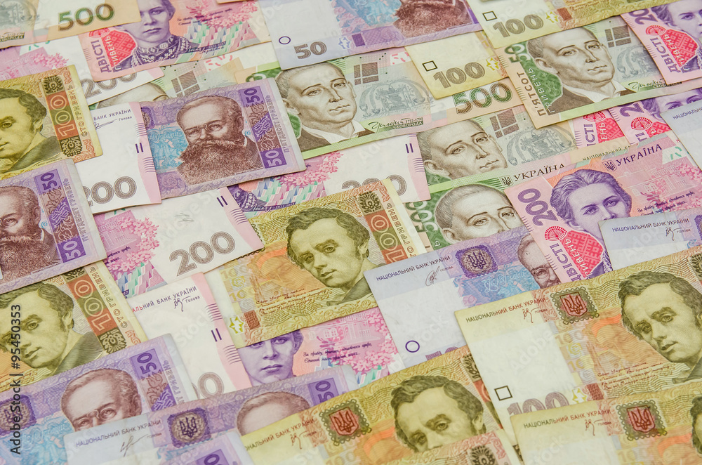 different ukrainian banknotes background close-up different ukrainian banknotes background close-up