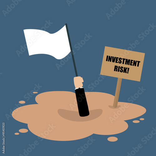 Businessman holds white flag sinking in a quicksand