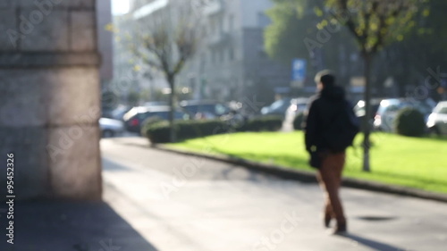 Wallpaper Mural defocused scene in a street city in which a man walking alone Torontodigital.ca