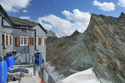 saving water in a high mountain hut. Bertol cabin, swiss alps photo