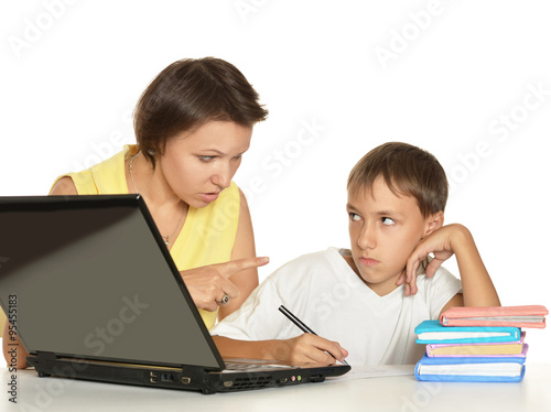 Mother and son doing homework