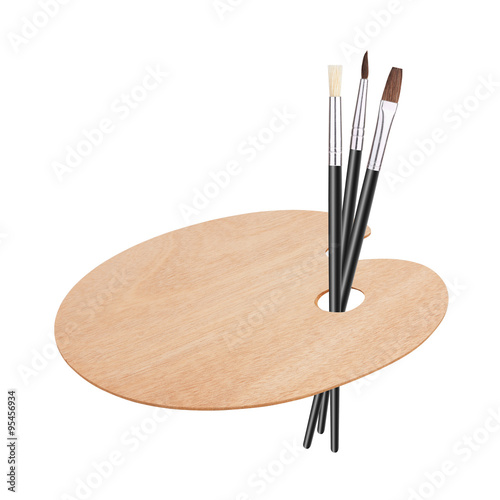 Wooden art palette with brushes