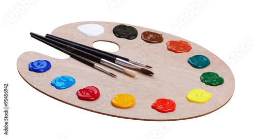 Wooden art palette with paints and brushes
