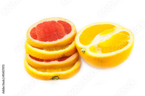 cutting grapefruit and orange