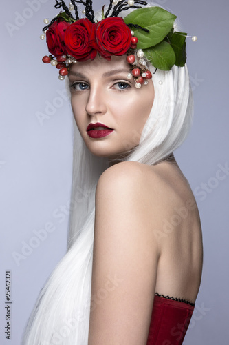 Beautiful girl in white wig, red roses, delicate makeup and wine lips.  Beauty face © Kobrinphoto