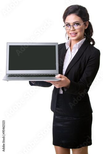 the business woman holds the laptop in hand