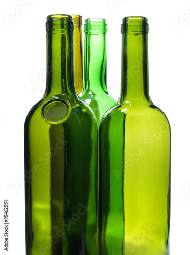 Green bottle of water and alcohol on white background 