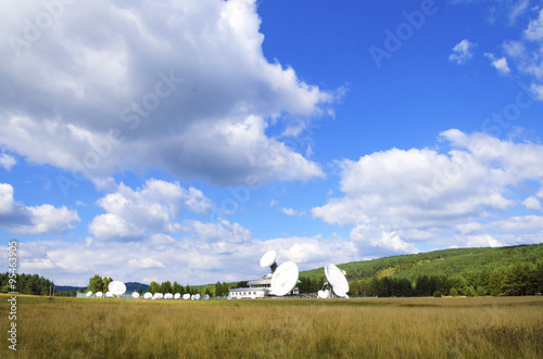 Satellite ground station in the field in the countryside
