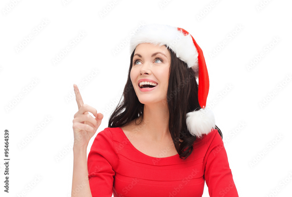 woman in santa helper hat pointing to something