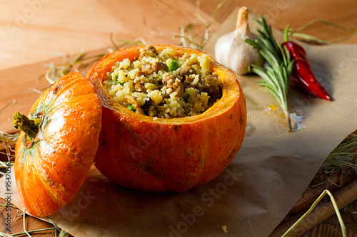 Ragout of duck with couscous, baked in a pumpkin