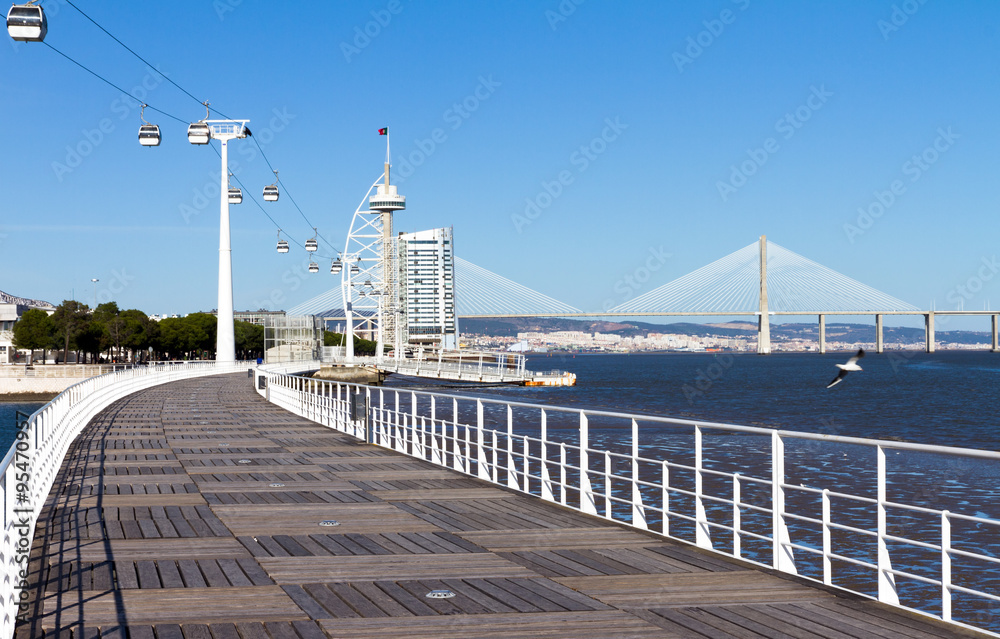 Walkway Lisbon expo '98 with in the distance the vasco da gama tower and bridge