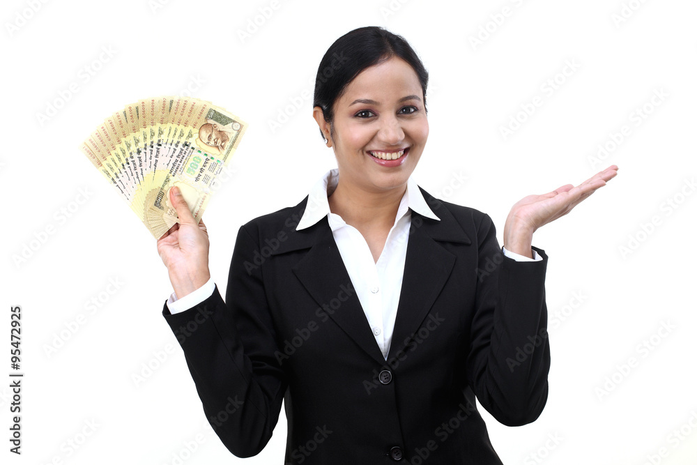 Young business woman with rupee notes in her hands Young business woman with rupee notes in her hands
