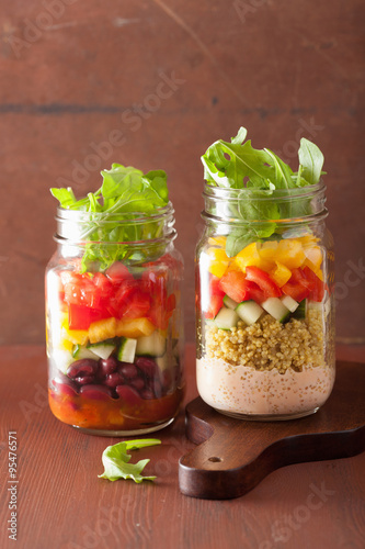 vegan quinoa bean vegetable salad in mason jars