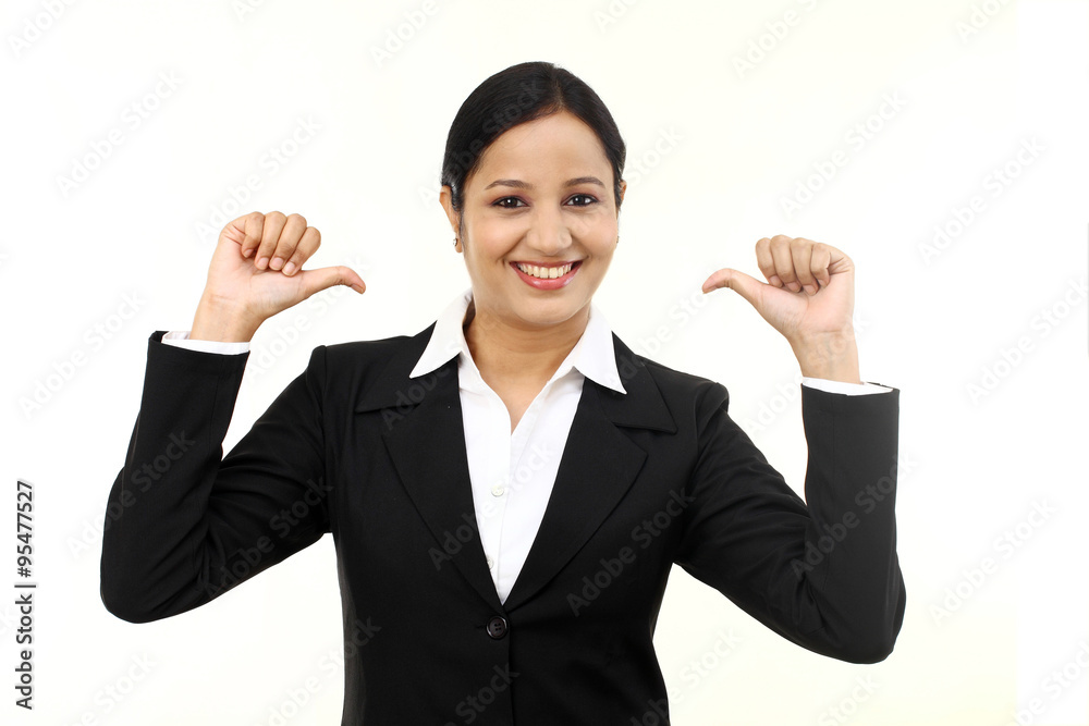 Cheerful business woman thumbs up isolated on white Cheerful business woman thumbs up isolated on white