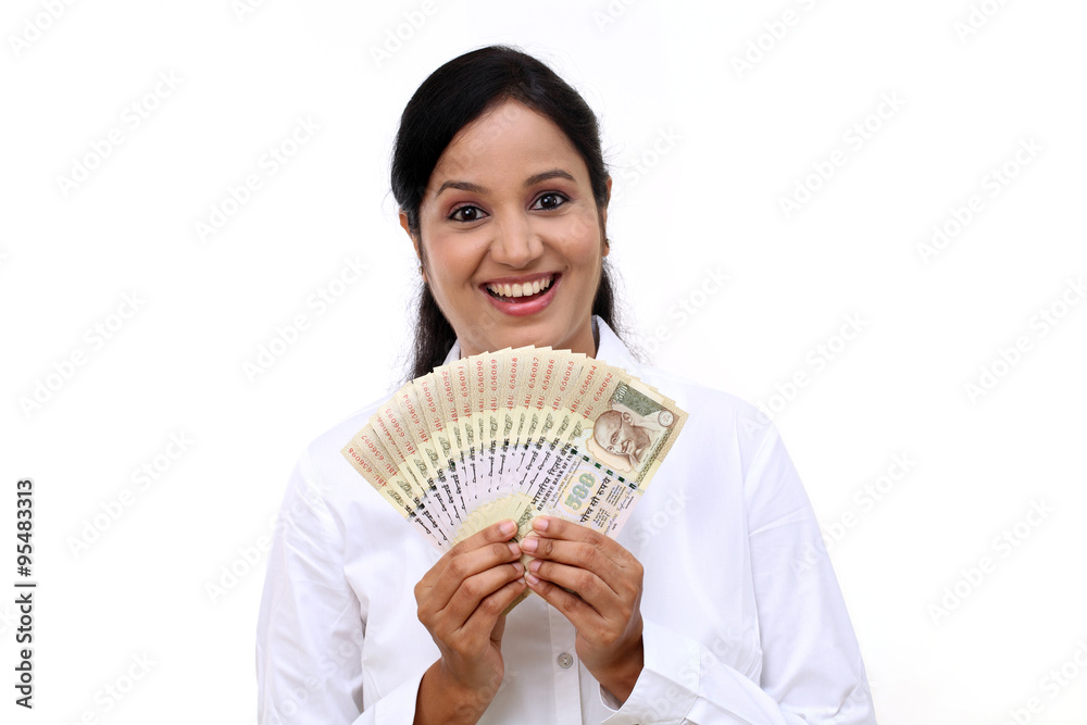 Young business woman with rupee notes in her hands Young business woman with rupee notes in her hands