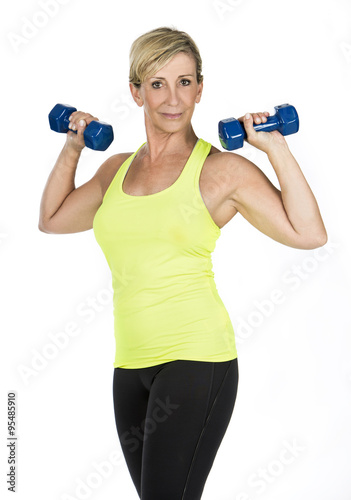 woman doing arms exercises with bumbbell