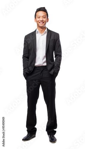 young business man standing isolated on white background