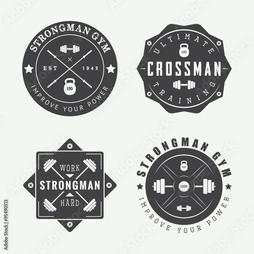 Set of gym logos, labels and slogans in vintage style. 