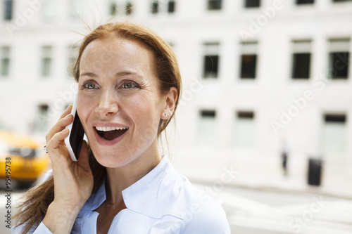 Attractive Mature Woman on Cell Phone