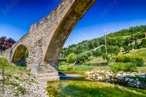 Details of medieval bridge in Italy photo