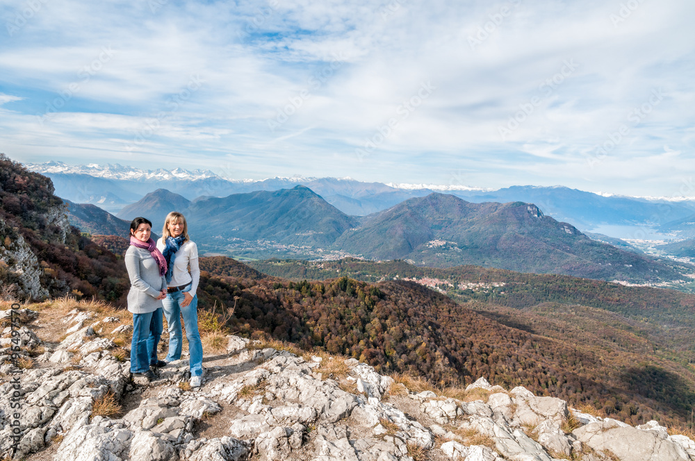 Happy women on top of the mountain, freedom concept. Happy women on top of the mountain, freedom concept.