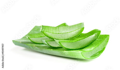 Heap sliced aloe leaves on a white background