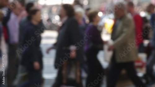 Very Unfocused pedestrians crossing a street in the city of Barcelona.(05)