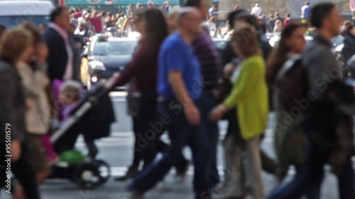 Unfocused pedestrians crossing a street in the city of Barcelona.(06)