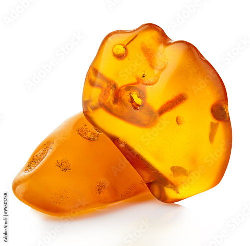 pieces of amber close-up isolated on a white background.