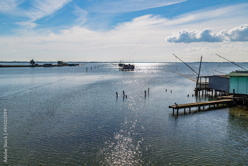 Obraz premium fishing huts with netfish
