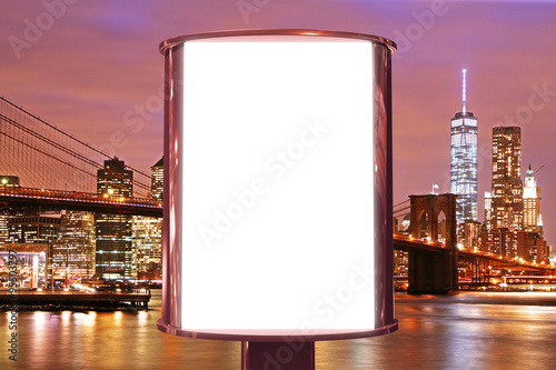 Blank billboard on the night city backgound, mock up