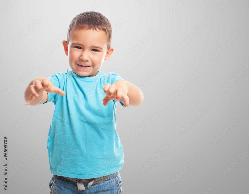 portrait of a little boy doing an animal gesture portrait of a little boy doing an animal gesture