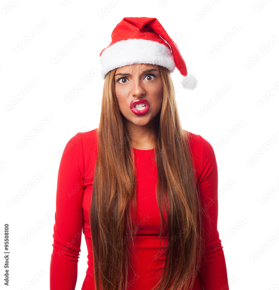 portrait of a beautiful young woman at Christmas with angry gesture portrait of a beautiful young woman at Christmas with angry gesture
