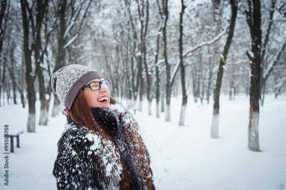 Young beautiful girl at winter