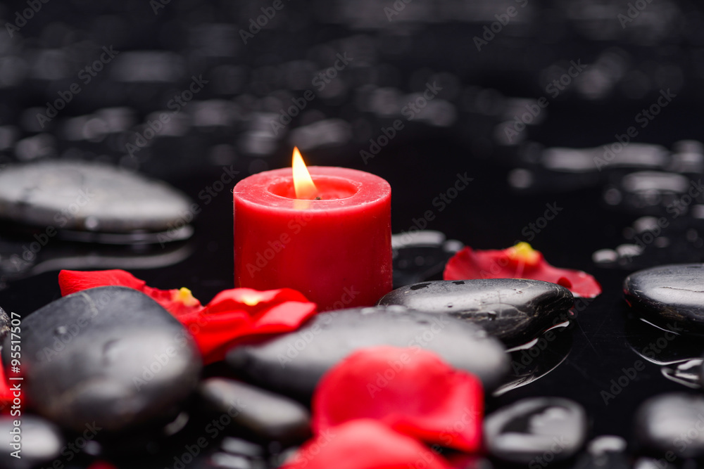 Still life with red rose petals with candle and therapy stones  - obrazy, fototapety, plakaty 
