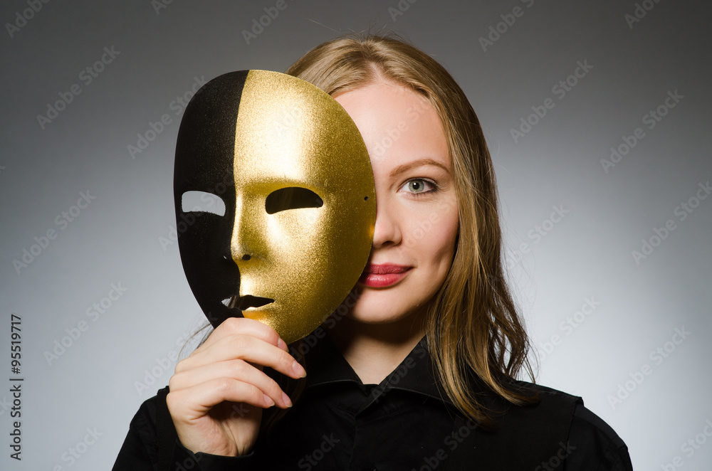 Woman with mask in funny concept Woman with mask in funny concept